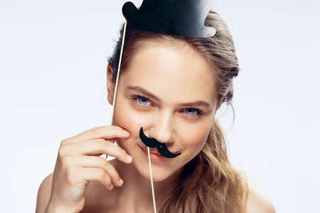 Woman with accessories on isolated background portrait.の写真素材