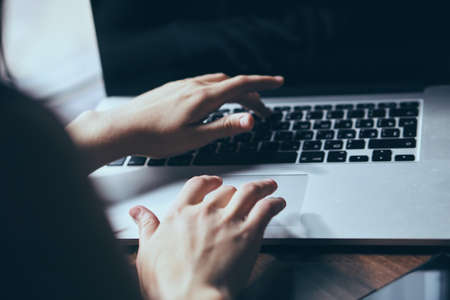 Business woman, business woman working behind laptop.