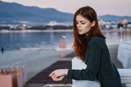 Woman on the waterfront, woman on the sea.の写真素材