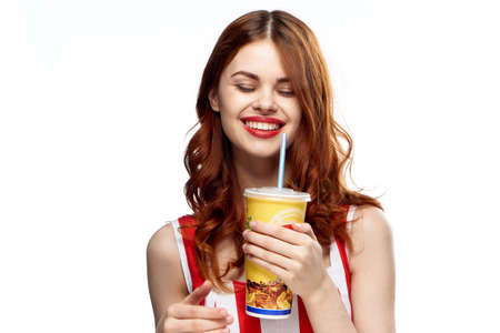 Woman smiling, woman with glass on isolated background.の写真素材