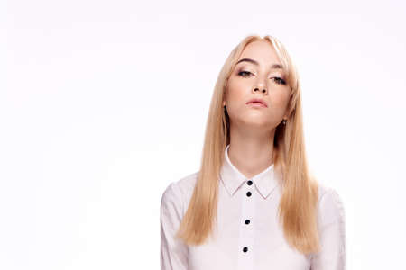 Blonde, business, portrait, white shirt, girl on white background, woman on isolated background.の写真素材
