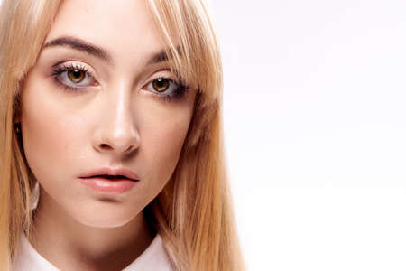 Portrait, blonde, woman on white isolated background, white shirt.の写真素材