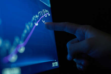 Computer, program, monitor, hand, binary code, software.の写真素材