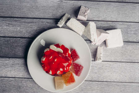 Sweets, marmalade, pastille, cakes, delicious, marshmallows, sweets on a plate.の写真素材