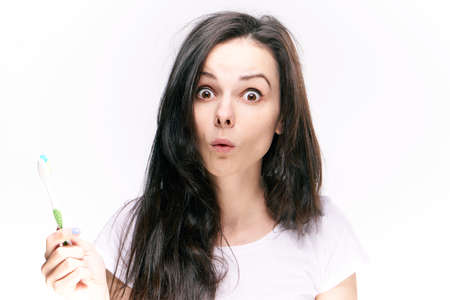 Woman with toothbrush, hygiene, oral hygiene, dental care, woman on isolated background.の写真素材