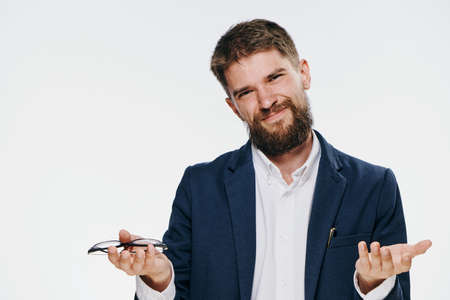 Business man with beard on white isolated background.の写真素材