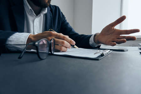 Business man, desk, laptop, computer, office, documents.の写真素材