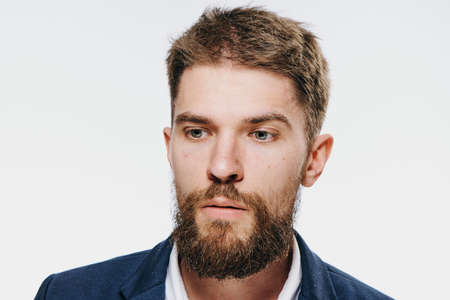 Business man with beard on white isolated background.
