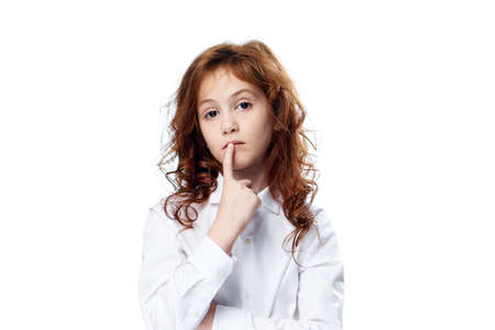Child, little girl on white isolated background, emotions.の写真素材
