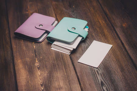 Multicolored business cards lie on the table, money.の写真素材