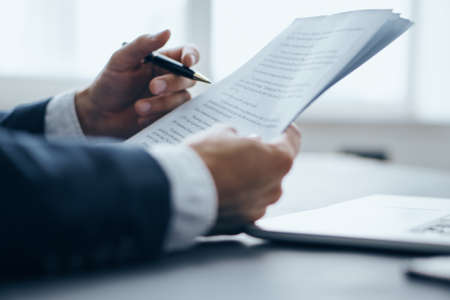 Work, hands, business, office, money, computer, laptop, phone, tablet, documents.の写真素材