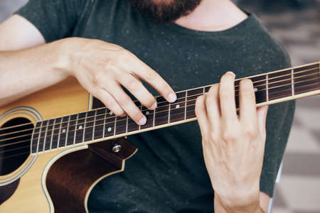 Guitar, musical instruments, sheet music, strings, tablature, mediator.