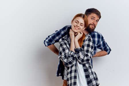 Young guy with beard and beautiful woman on white isolated background.の写真素材