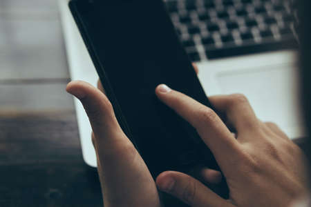 Hands, business, office, documents, tablet, phone, laptop, computer, money.