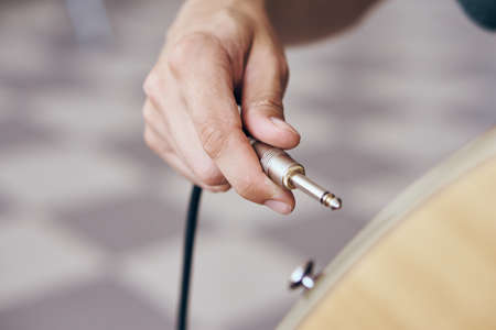 Guitar, musical instruments, amplifier, mediators, sheet music.