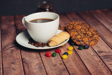 cup of coffee with sweets and biscuitsの写真素材