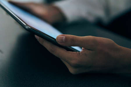 Hand holding tablet PCの写真素材