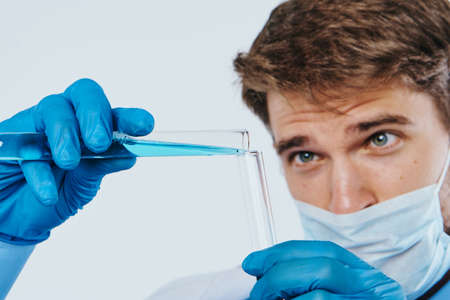 Man with a beard on white isolated background, science, medicine, doctor, scientist.