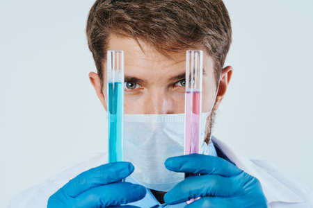 Man with a beard against a light background, doctor, medicine, scientist, science.の写真素材