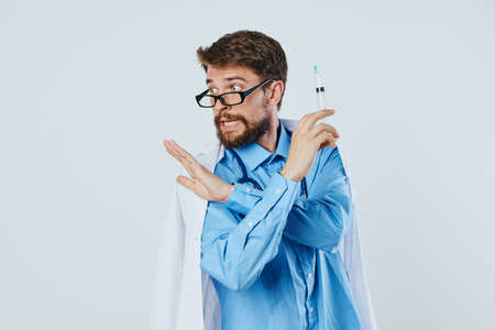 Man with a beard against a light background, doctor, medicine, scientist, science.の写真素材