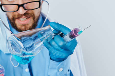 Man with a beard against a light background, doctor, medicine, scientist, science.の写真素材