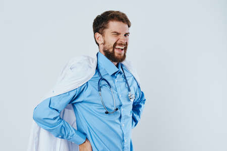 Man with a beard against a light background, doctor, medicine, scientist, science.の写真素材