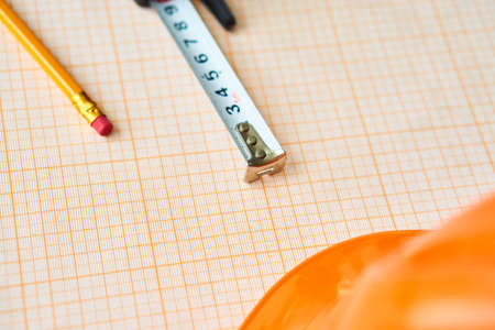 Drawings, engineering, desktop, ruler, helmet, construction, work.の写真素材