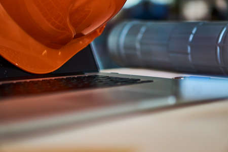 Tools, construction, engineering, blueprints, desktop, tube, laptop, helmet.の写真素材