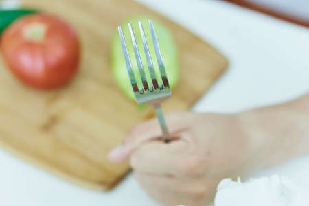 Hands, vegetables, food, man at the table, vegetarianism, diet.
