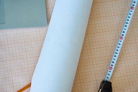 Desktop, construction, helmet, ruler, drawings, tube, engineering.の写真素材