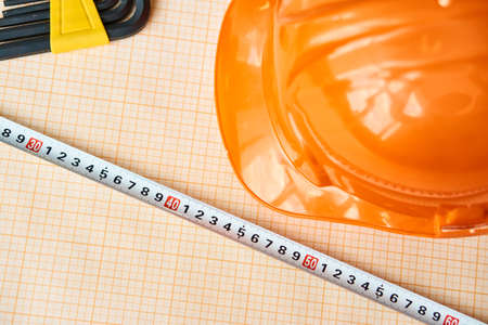 Desktop, construction, engineering, helmet, drawings, engineer, ruler.の写真素材
