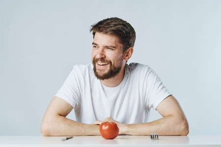 Happy man on a vegetable dietの写真素材