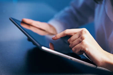 Work behind a digital tabletの写真素材