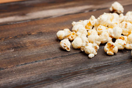 Popcorn lies on the table, food, cinema, delicious, sweet.の写真素材