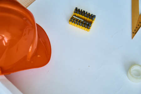 Construction tools on the table, helmet, drawing, engineering, engineer.の写真素材