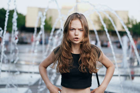 A woman swears in the street.の写真素材