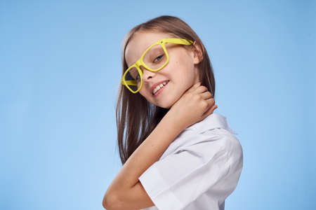 child, girl in yellow glasses, portrait.
