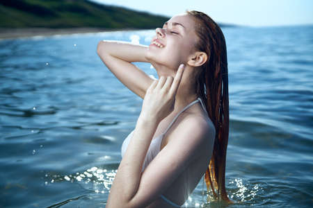 woman in the sea, smile, vacation.の写真素材