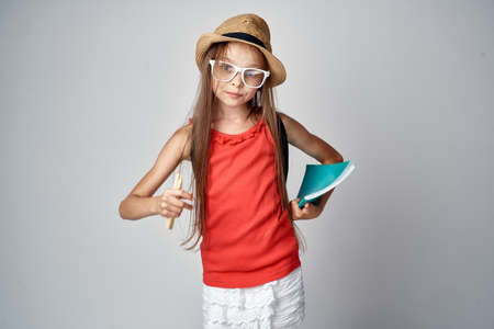 a girl with glasses and a hat.の写真素材