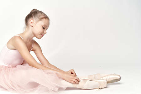 girl ballerina on a white background.の写真素材