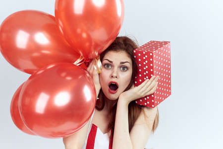 young woman, surprise, emotion, portrait, balloons.の写真素材