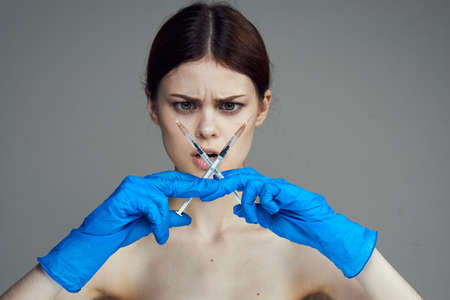 syringes, woman.の写真素材