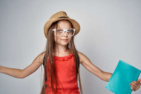 a girl with glasses and a hat.の写真素材