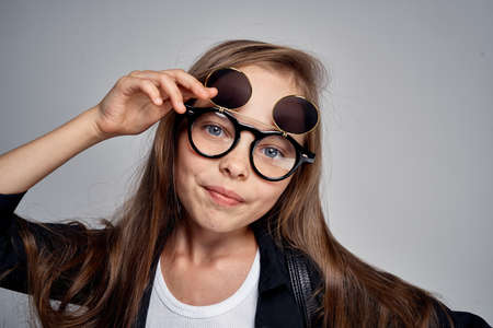 portrait of a girl in black strange glasses.の写真素材