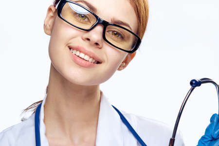 cute girl doctor with a bright smile.の写真素材