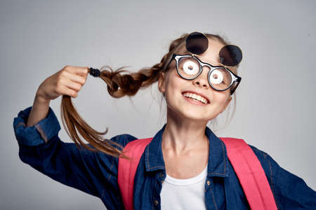 the girl in the strange glasses is very satisfied.