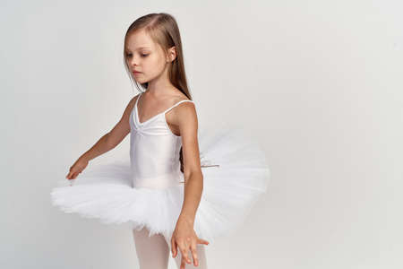 A small ballerina in a pack begins her steps.の写真素材