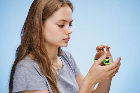 woman having fun with spinner.