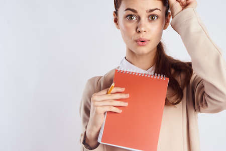 student in bright clothes and with notebook.の写真素材
