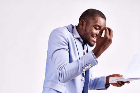 business man gesturing against white background.の写真素材